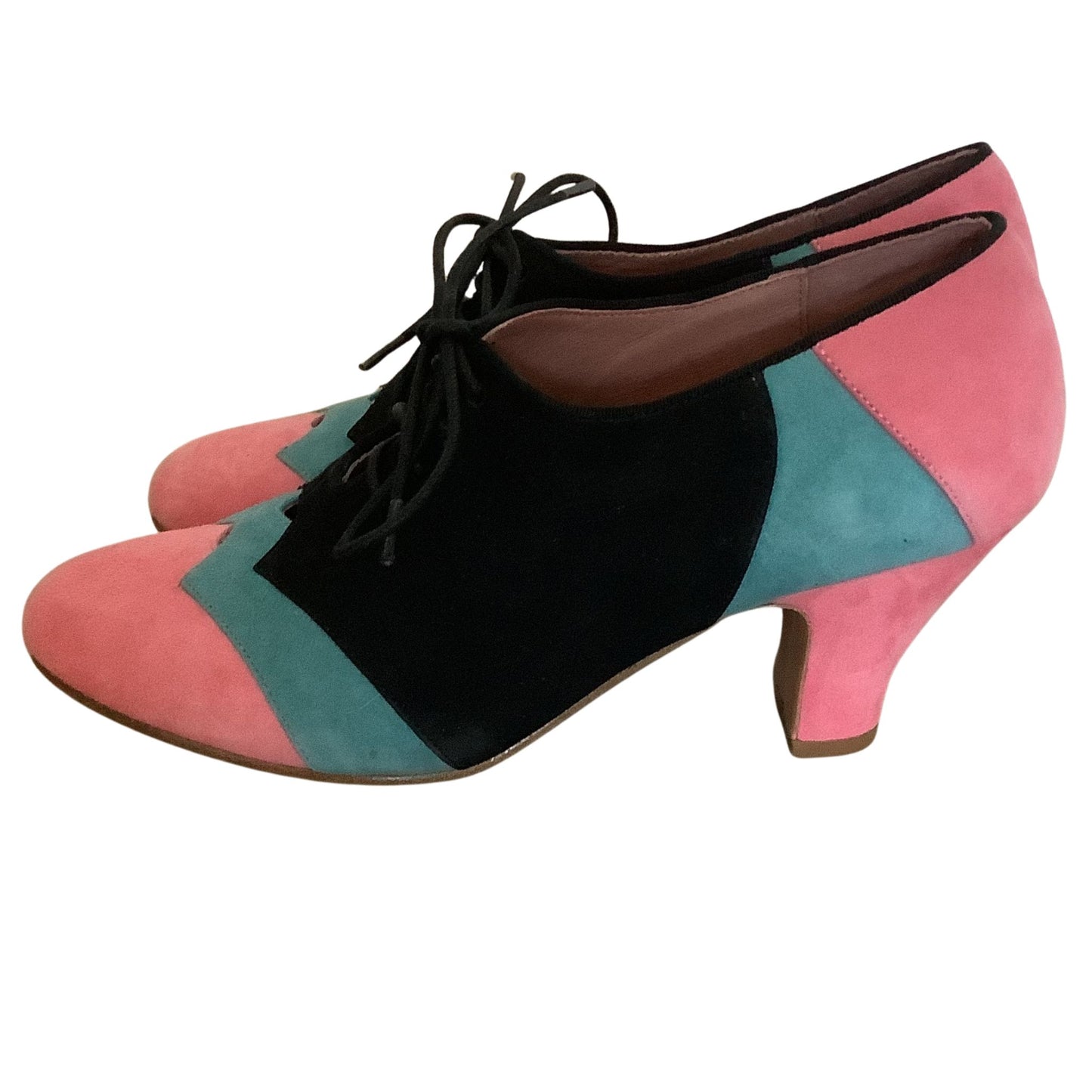 American Duchess multicolor heels left side profile showing faux suede construction on white background
