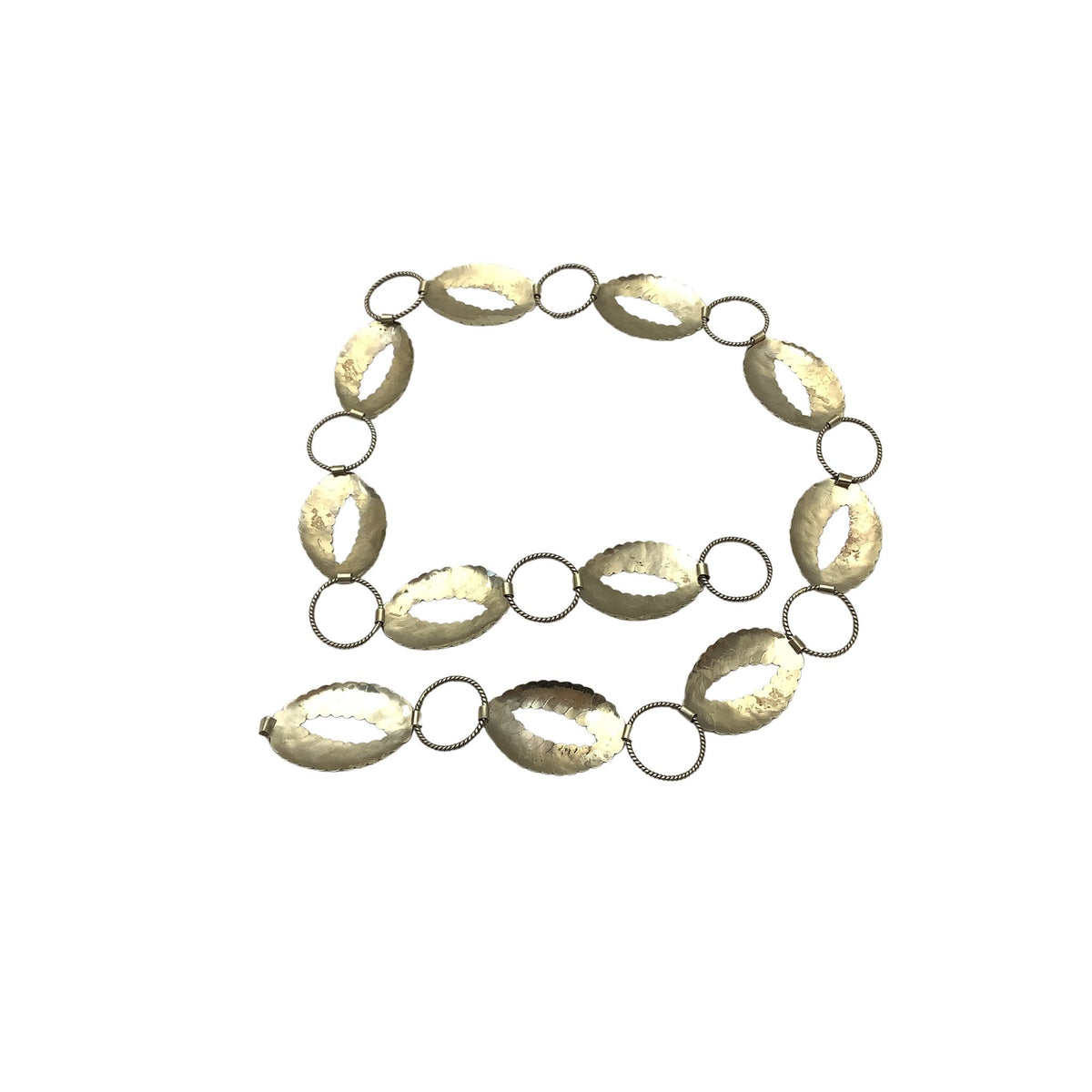A vintage silver-tone metal chain belt featuring textured, metallic oval links separated by small silver-toned rings, shown on a plain white background.