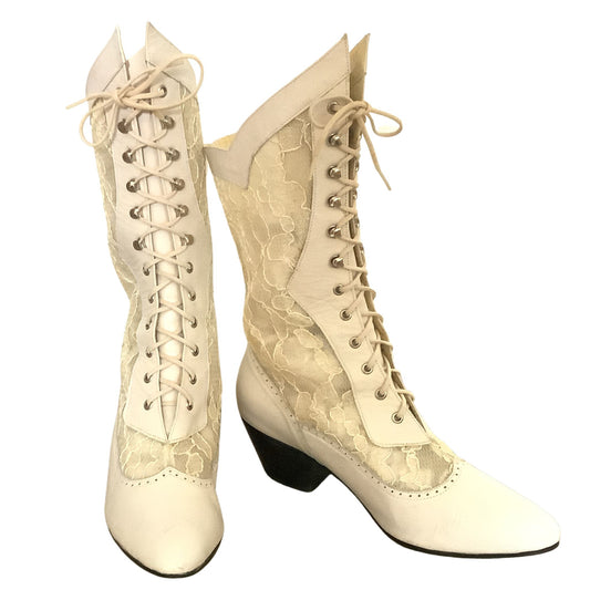 Front and Side View Pair of white lace-up boots on a white background