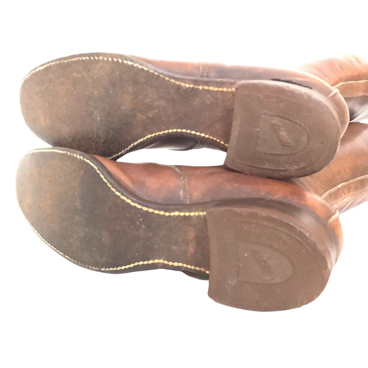 White stitched soles View of a pair of antique Lace-up Women's Boots Brown Leather.
