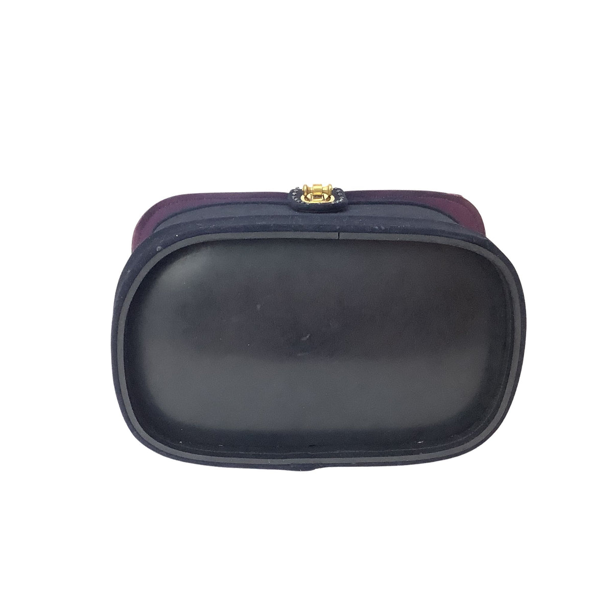 View of oval shaped bottom of a vintage Stylecraft handbag. 