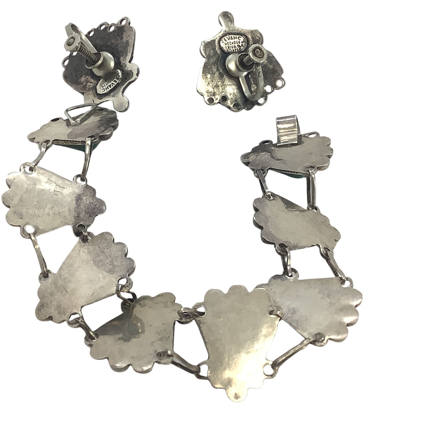 Bracelet and earrings back view on a white background