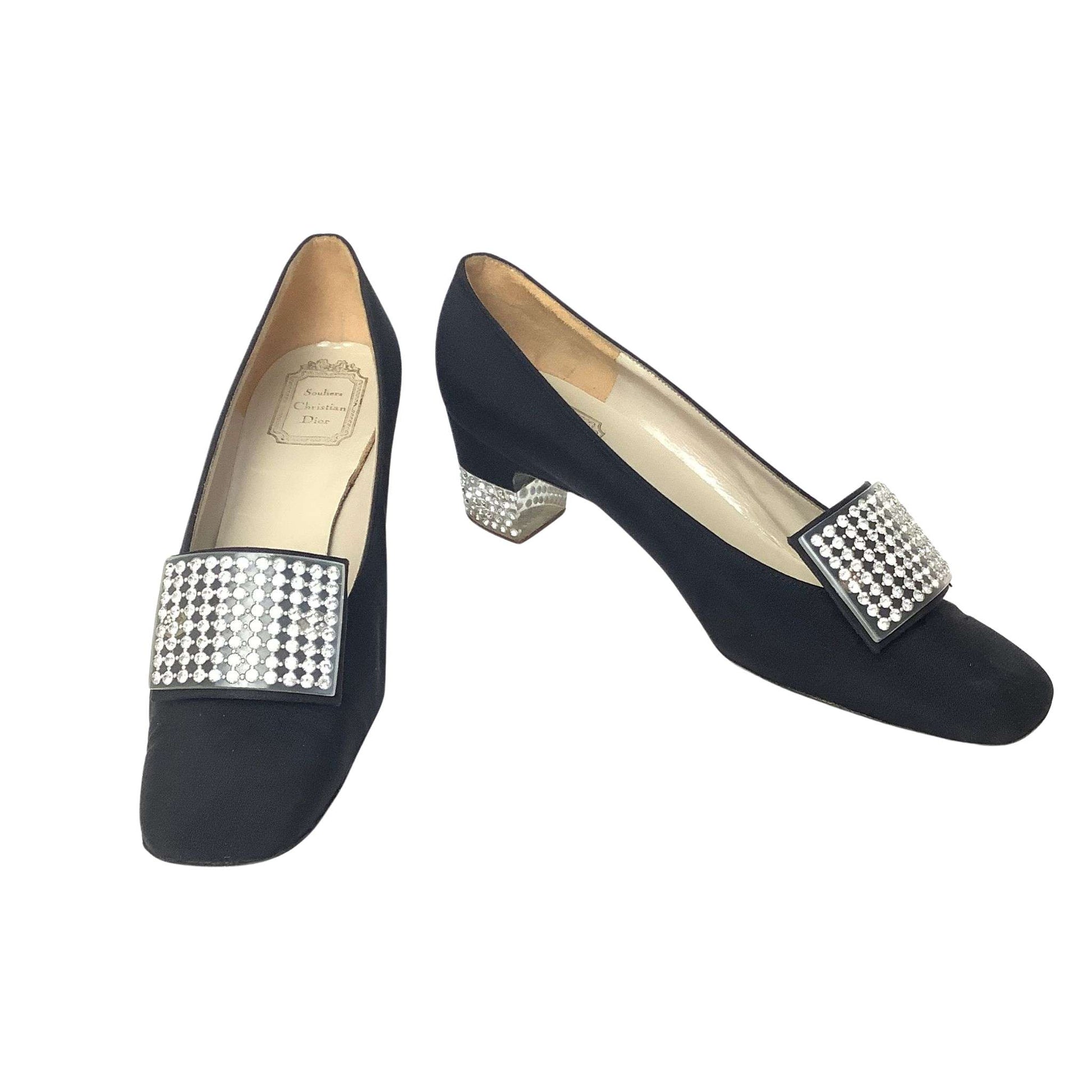 Front view of black high-heeled shoes with rhinestone embellishements