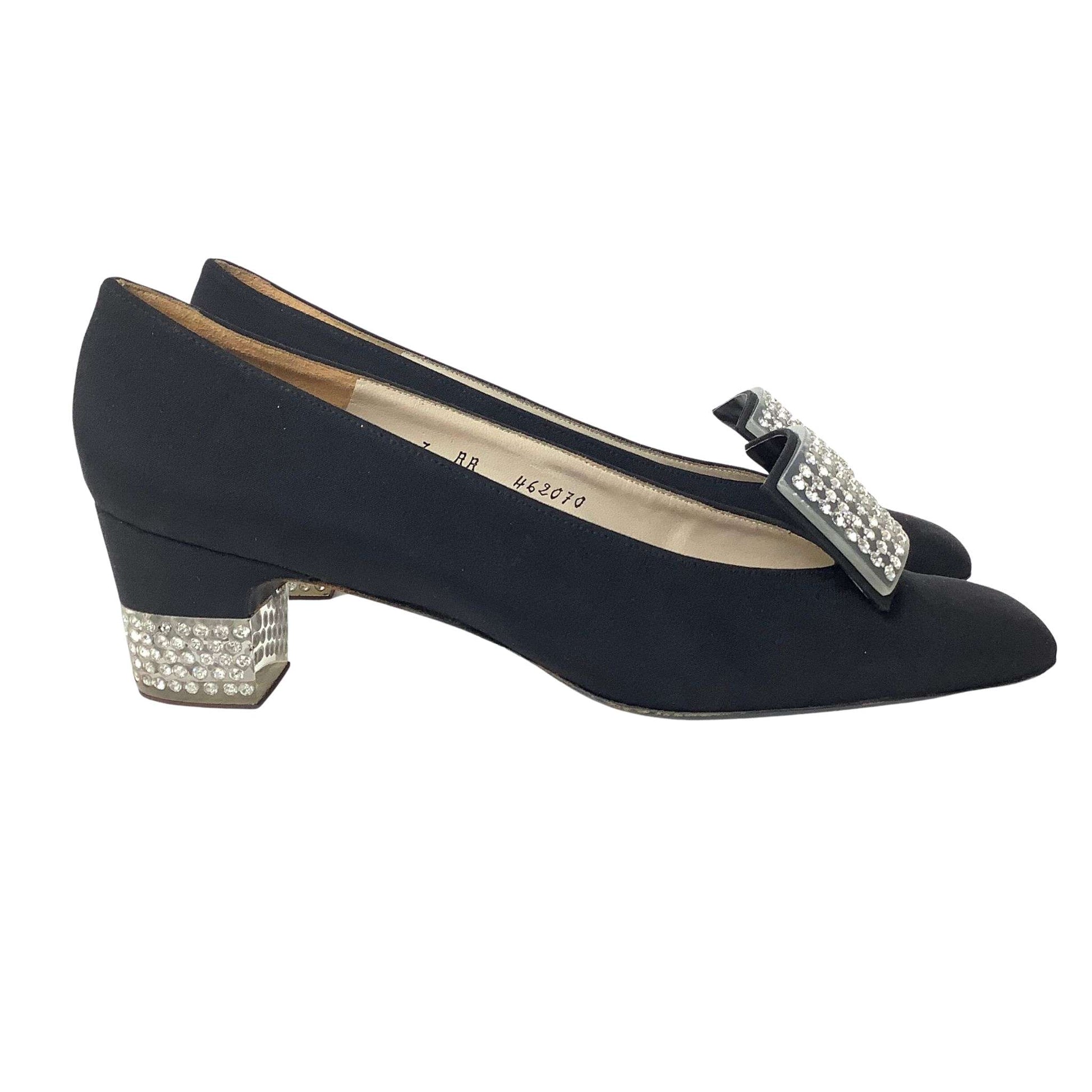 Black high-heeled shoes with decorative embellishments right-side view