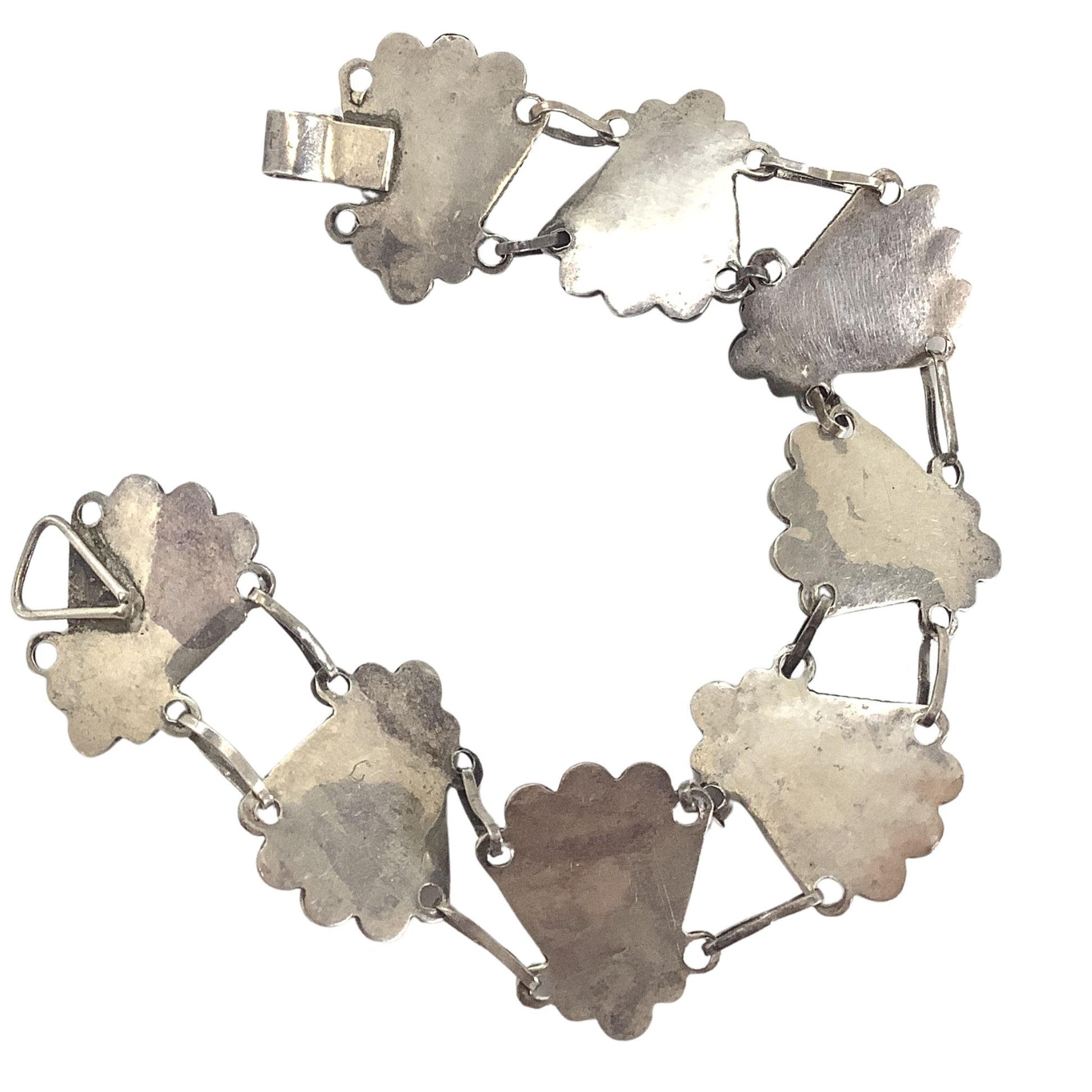 Close-up view of the back of the bracelet on a white background