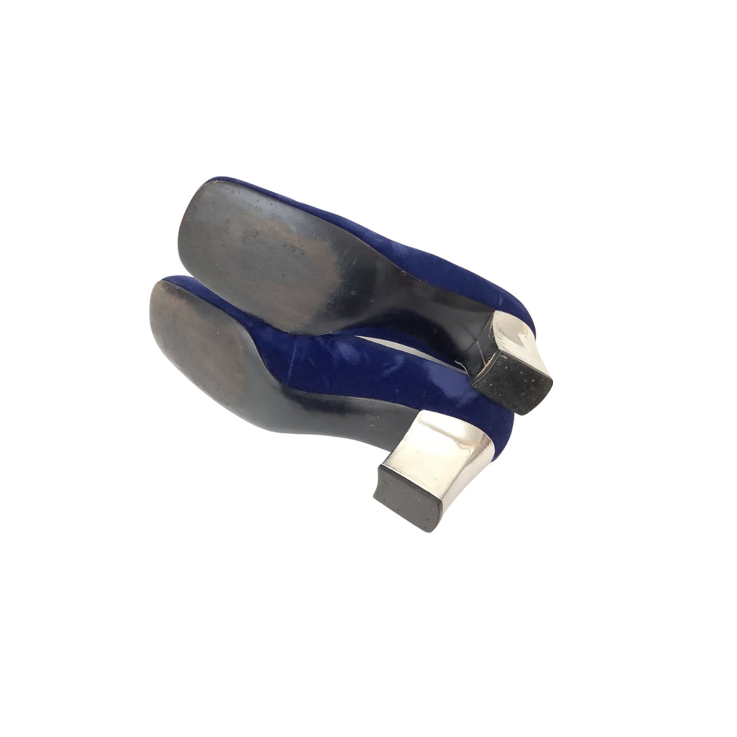 A pair of vintage Custom Craft mid-size heel shoes shown from the sole side, featuring navy blue uppers with silver-toned metal heels and dark soles, set against a plain white background.