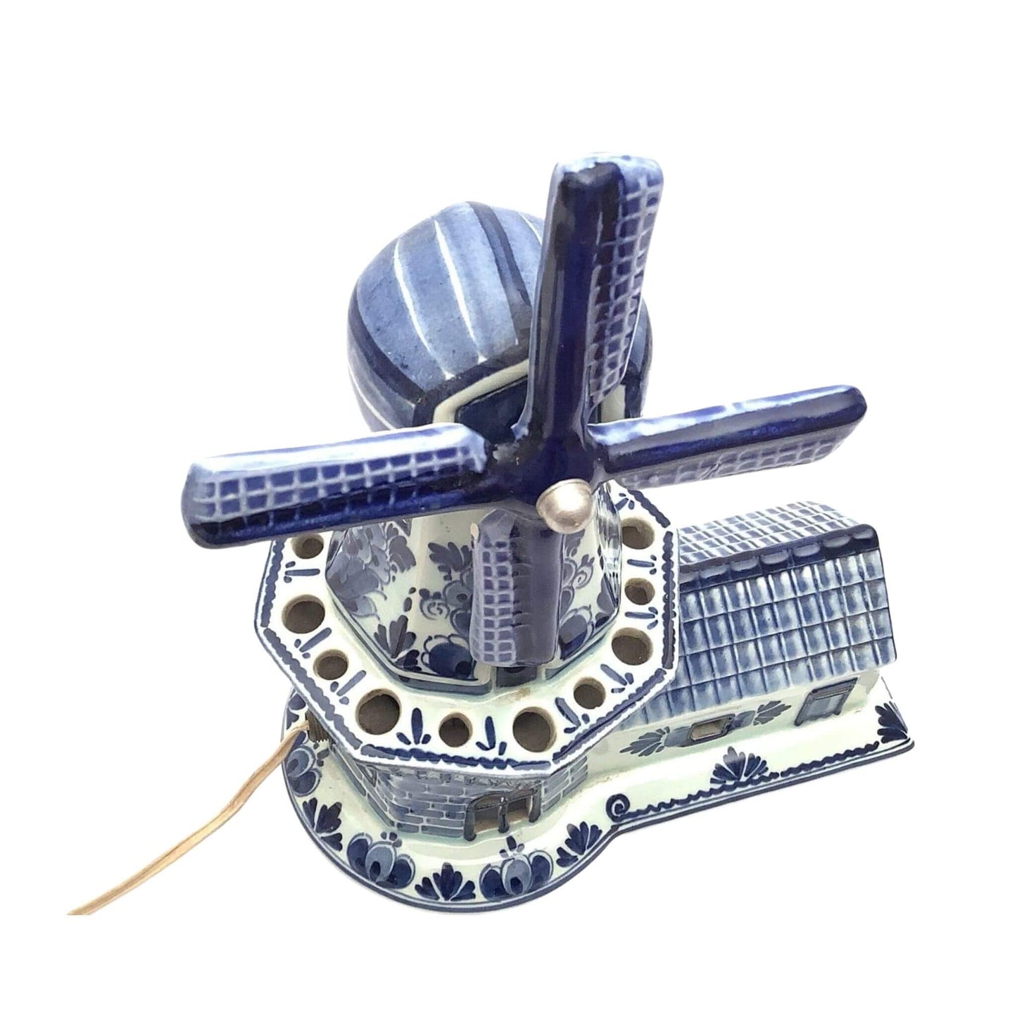 Delfts decorative windmill with blue and white design detail-view on a white background