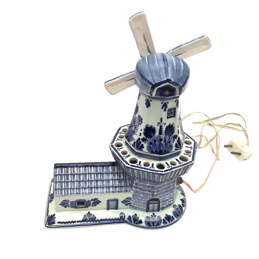 Delfts ceramic windmill with blue and white design front-view on a white background