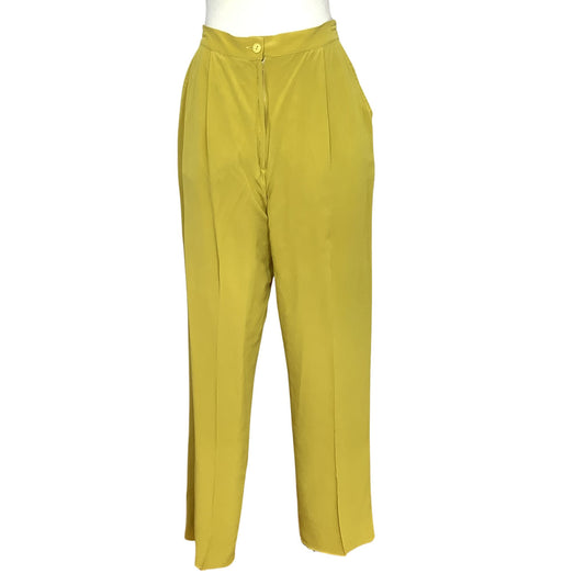 Donna Mizar high-waisted, wide-leg trousers in a solid chartreuse green color, displayed on a white mannequin torso against a plain white background.