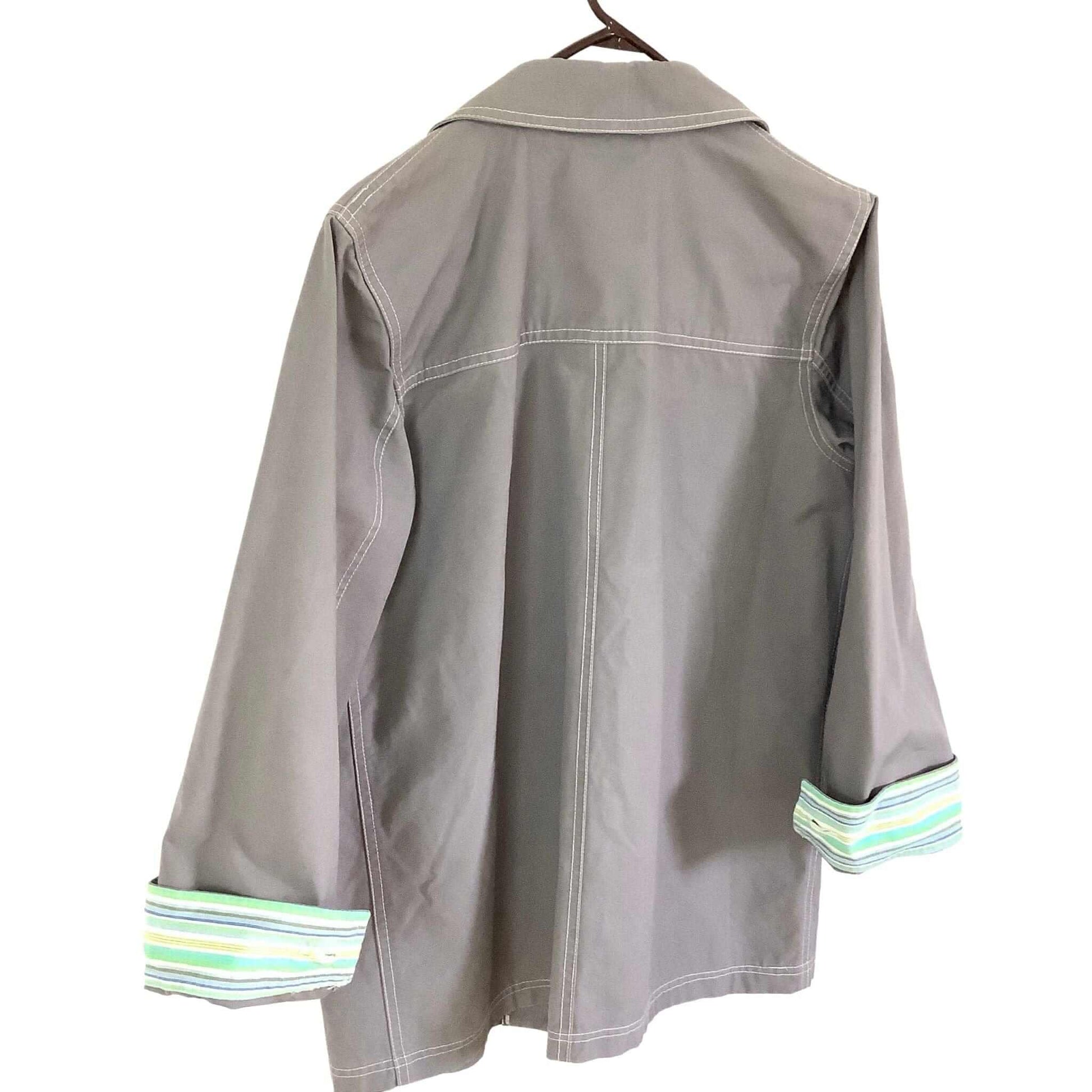 Back of gray jacket with striped cuffs