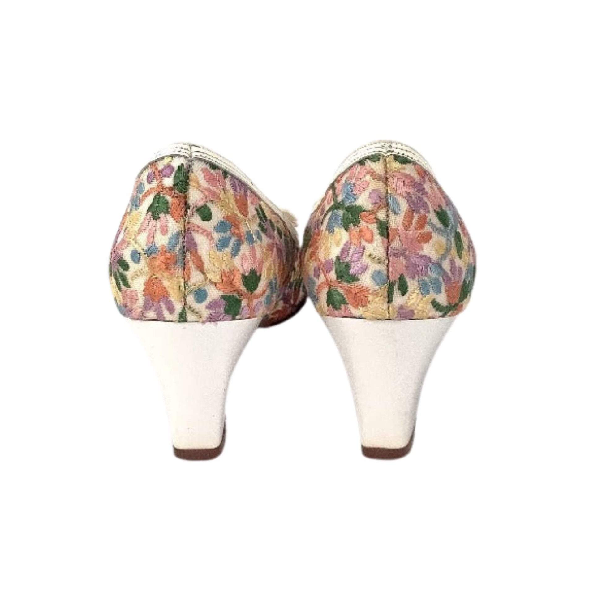 Pair of embroidered high-heeled shoes back view