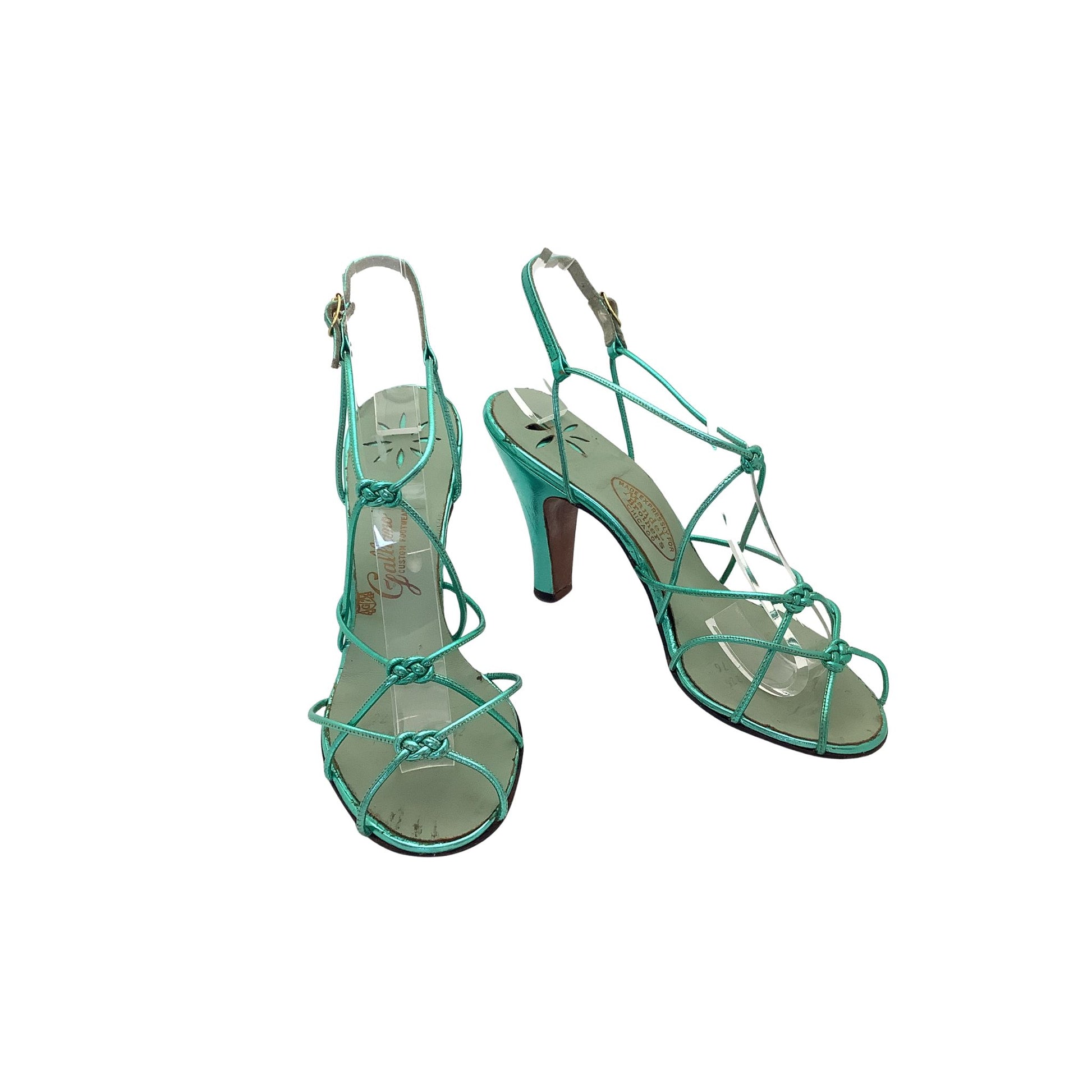 Front and side view of a pair of vintage Galliano heels