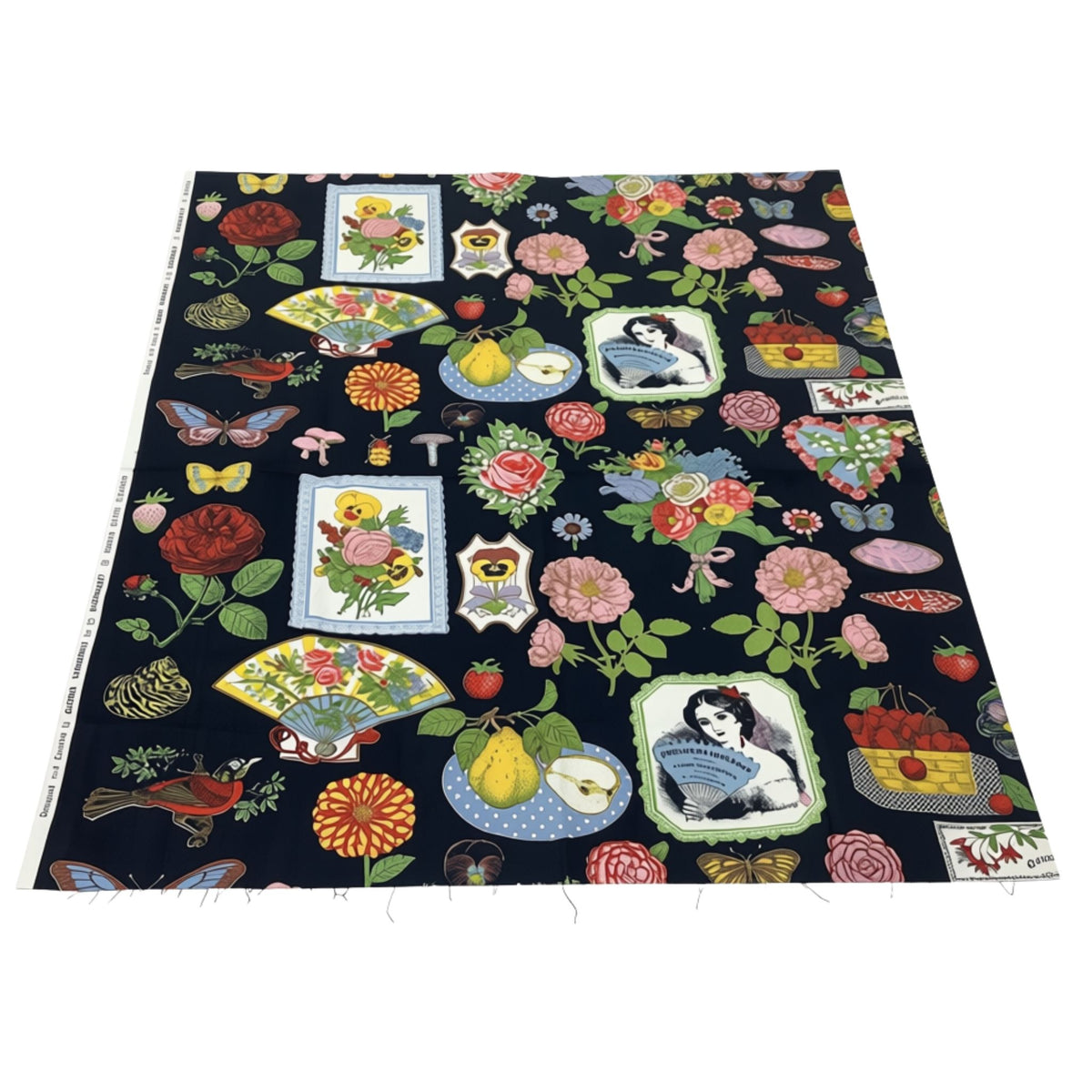 A square piece Gloria Vanderbilt fabric remnants with a black background, featuring a dense, colorful patchwork print of vintage-style illustrations including flowers, fruit, butterflies, birds, and portrait frames.