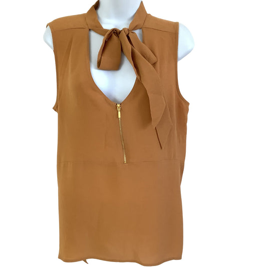 Mustard sleeveless top with a bow neckline on a mannequin against a white background
