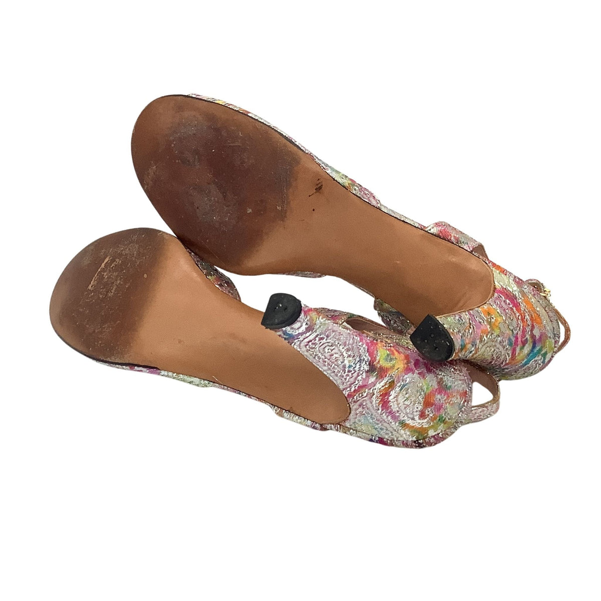 View of soles vintage Lewis Design slingback heels, metallic purple psychedelic pattern.