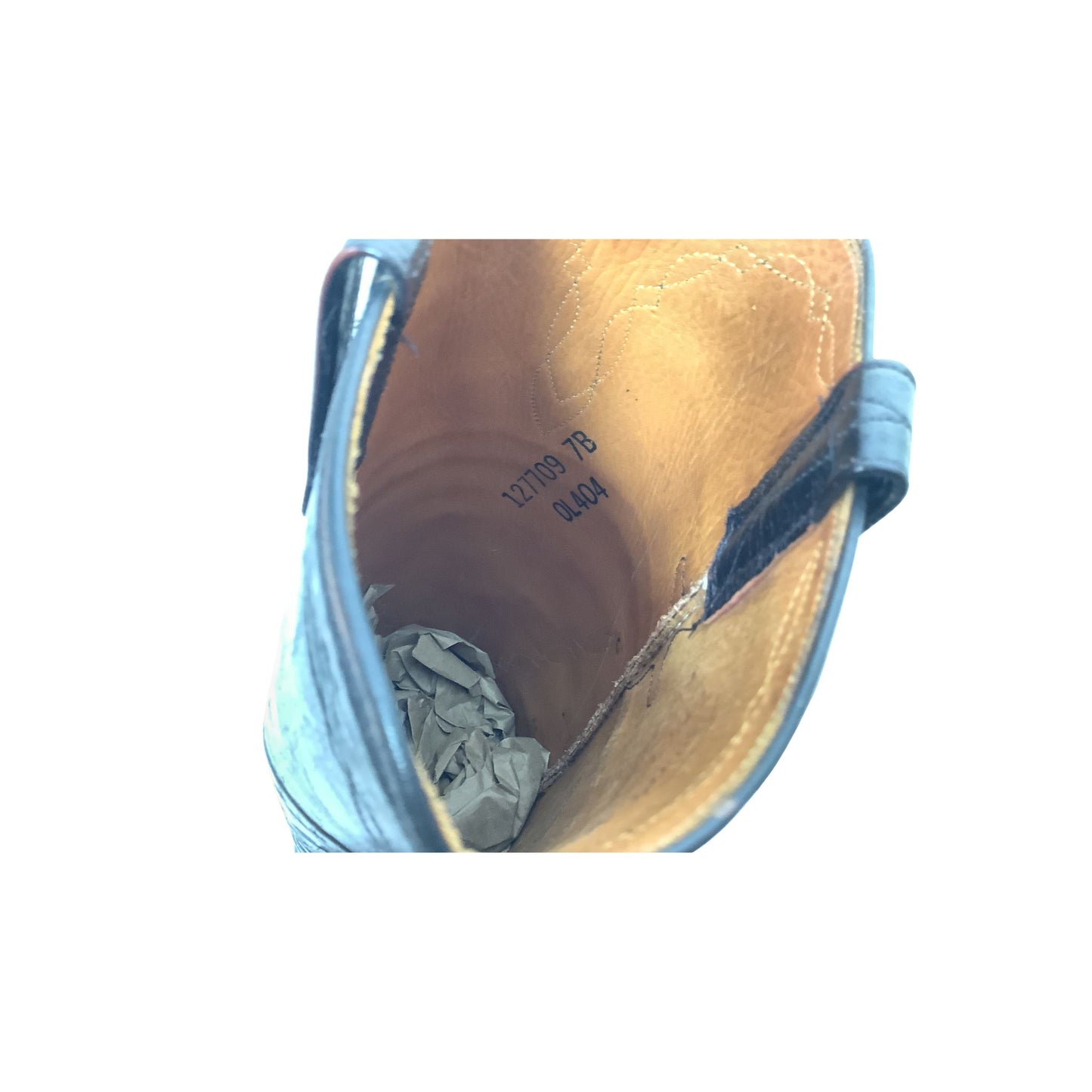 Interior of Lucchese tall western boot showing marked size 7B.