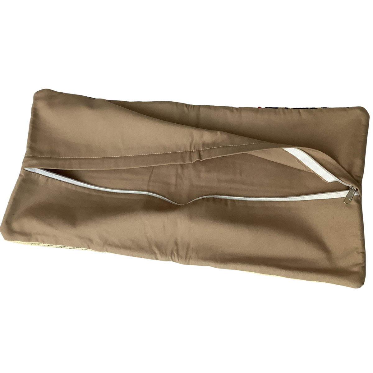 A tan zippered fabric lumber pillow cover shown on a plain white background.
