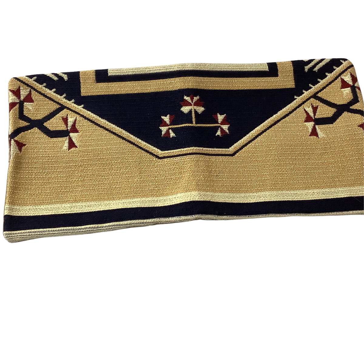 Lumbar pillow rectangular shape with geometric designs.