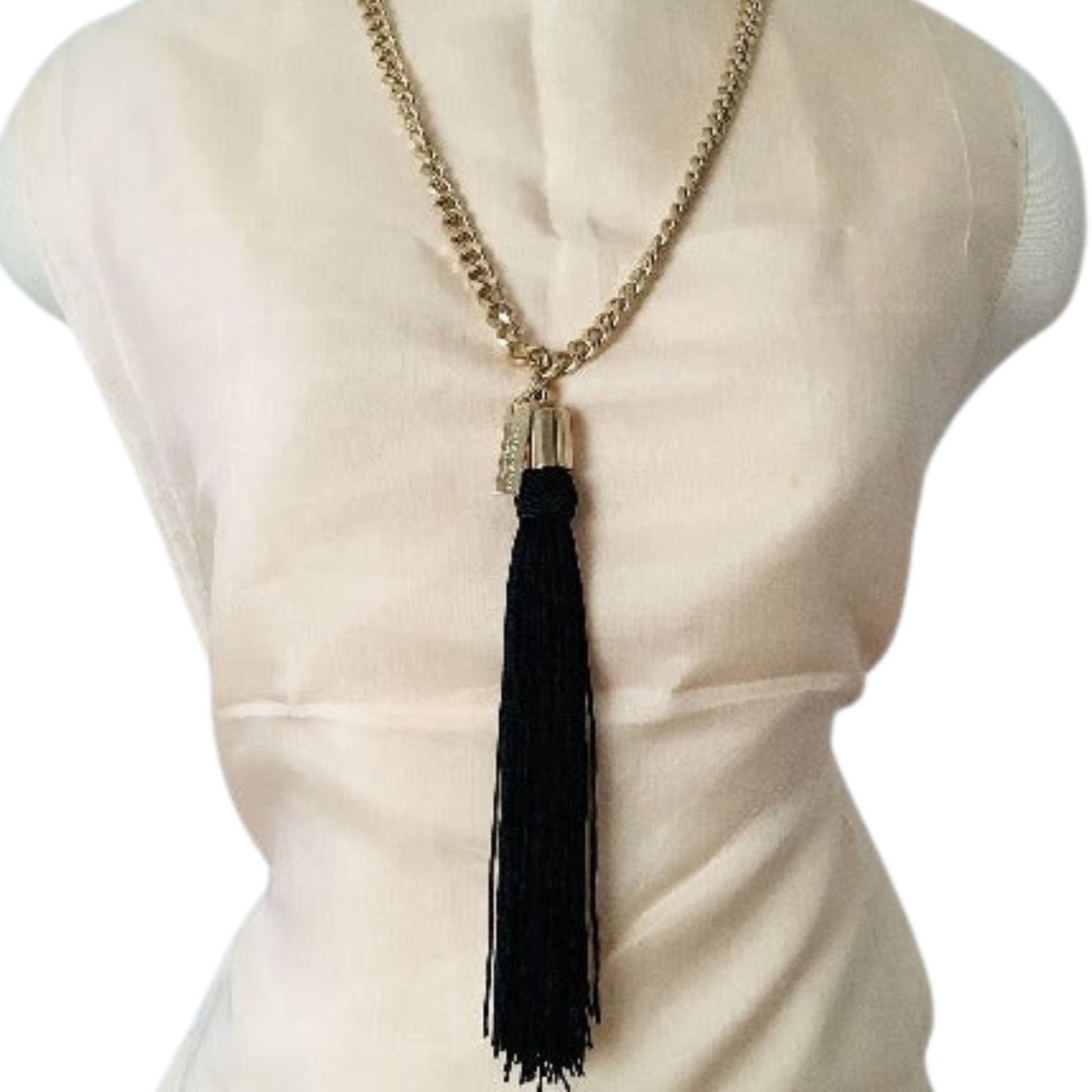 Marc Jacobs baroque gold chain with black tassel necklace on mannequin