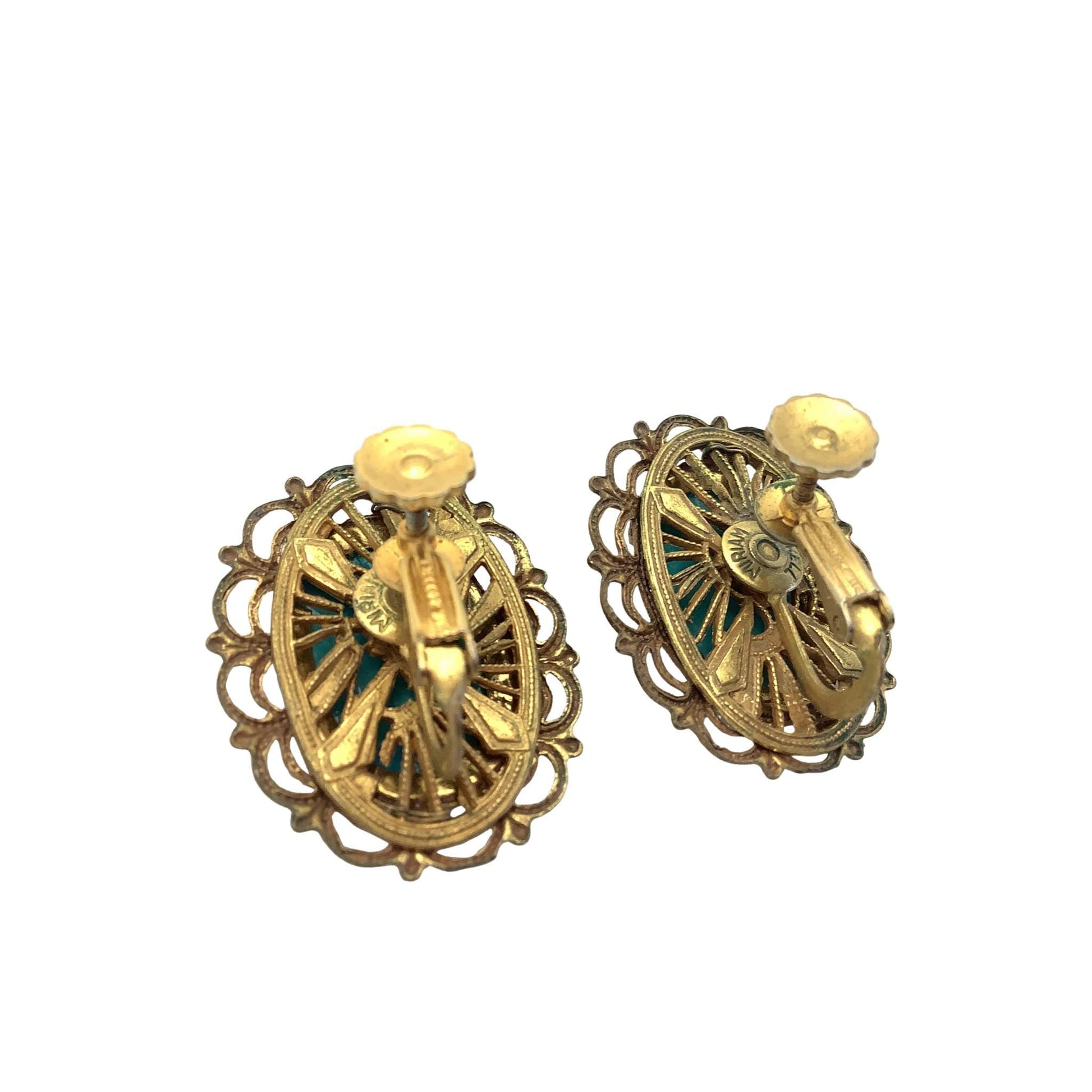 Pair of Miriam Haskell gold tone filligree design view of signature