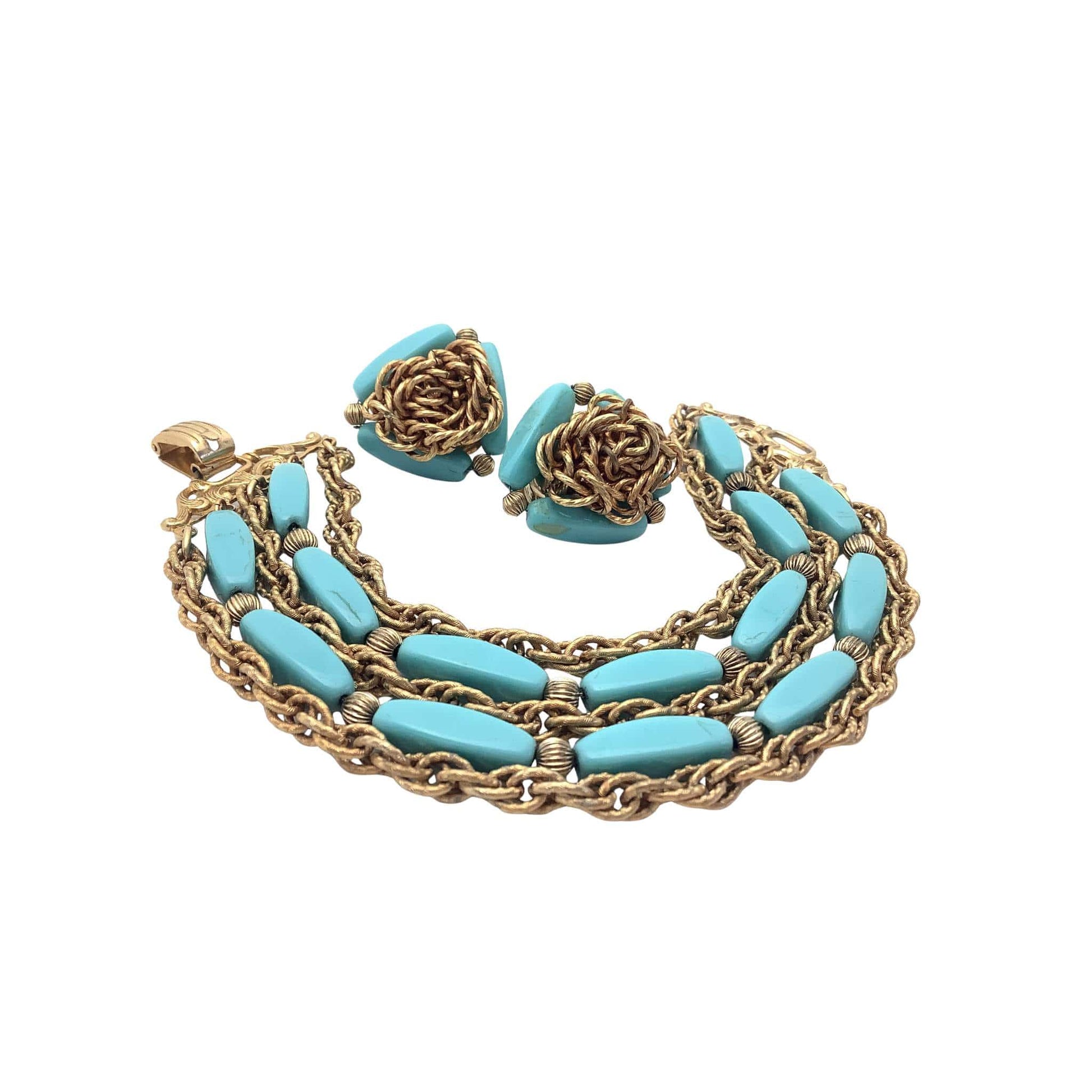 Necklace and earrings set with turquoise stones and gold chains
