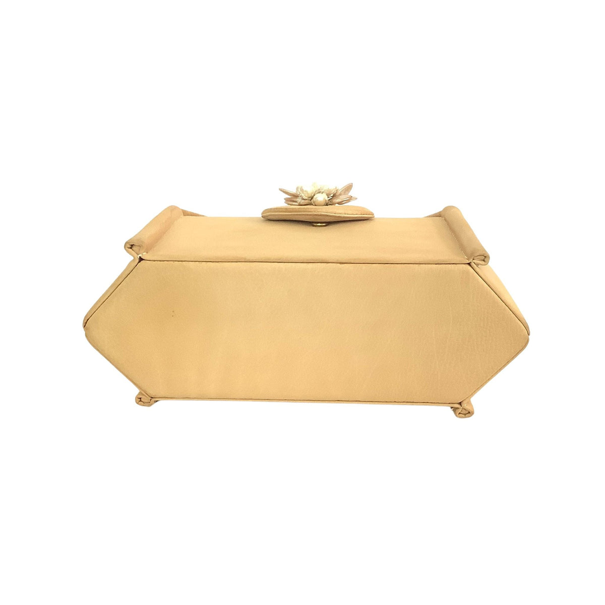 View of bottom of Palizzio yellow handbag with cluster pearl adornment.