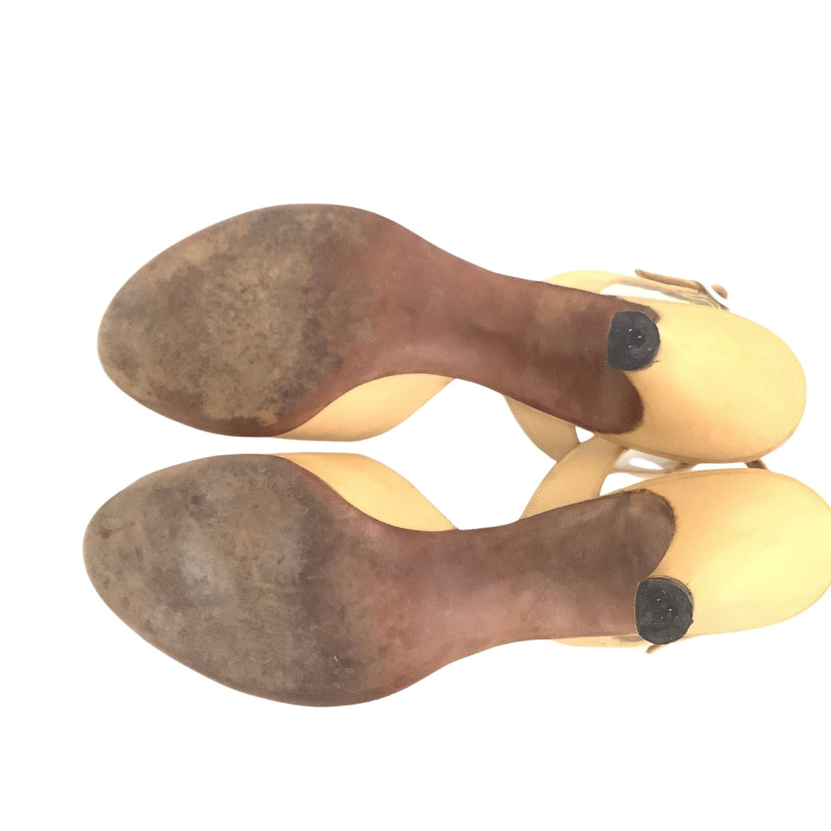Palizzio women's high-heeled shoes shown from the sole, featuring a yellow  leather upper.