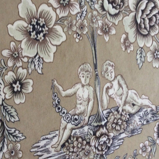 Vintage fabric sample with cherubs and flowers in brown black and beige.