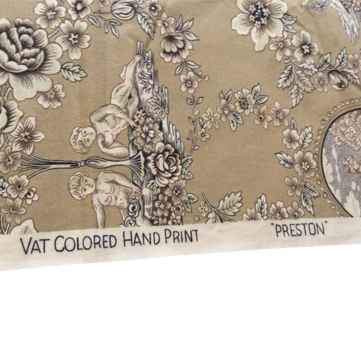 Label view of vintage Preston Fabric Sample with cherubs and flowers in brown with beige and black.