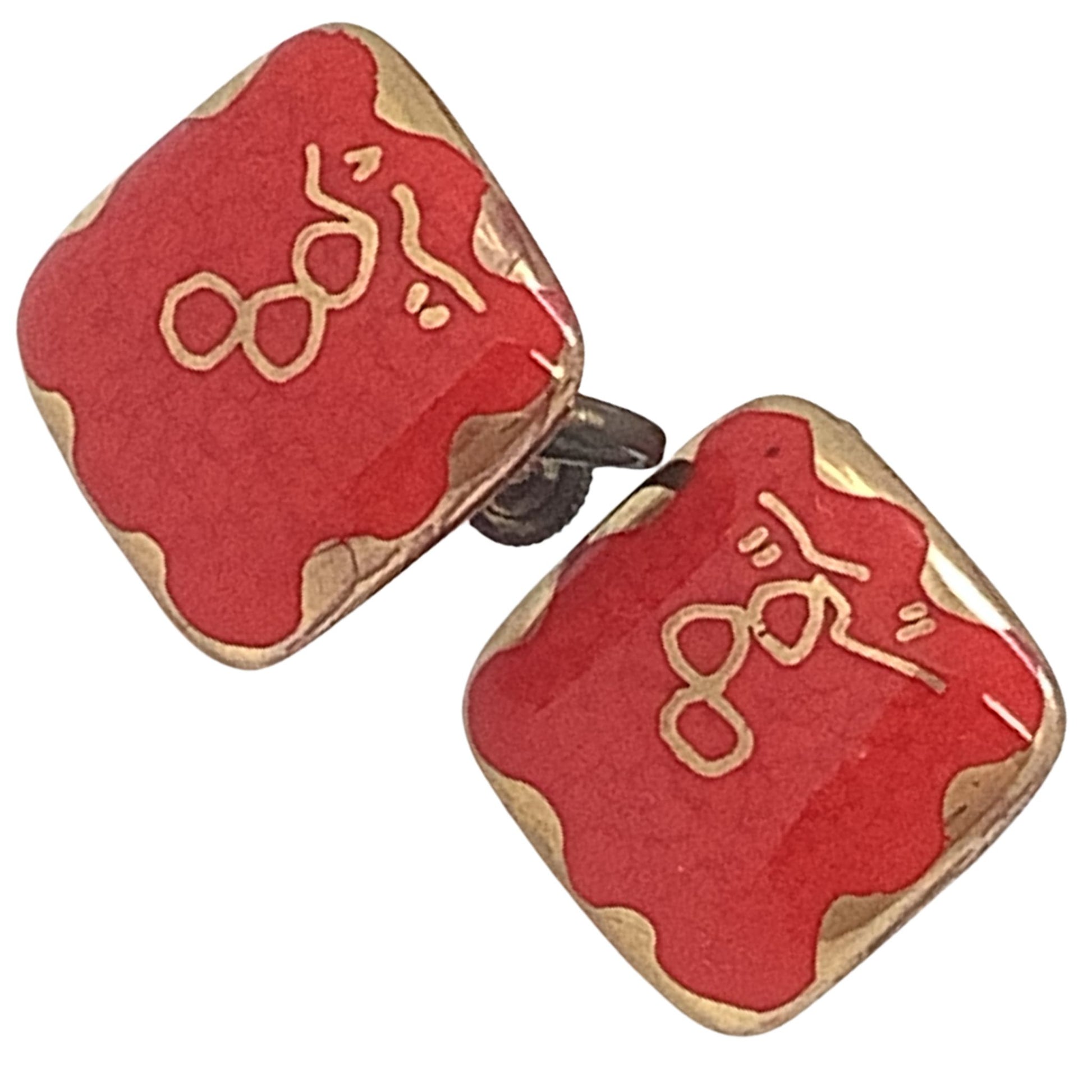 Red 1950s Southwestern Earrings close-up on a white background