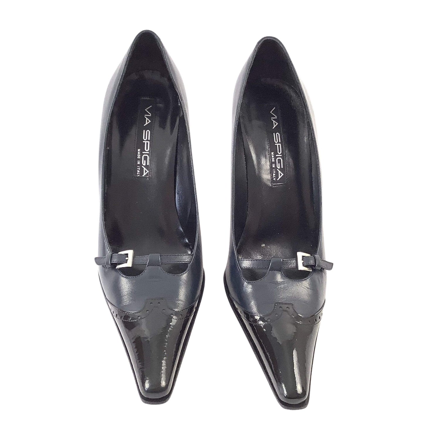 Pair of black high-heeled shoes with 'via spiga' branding top view