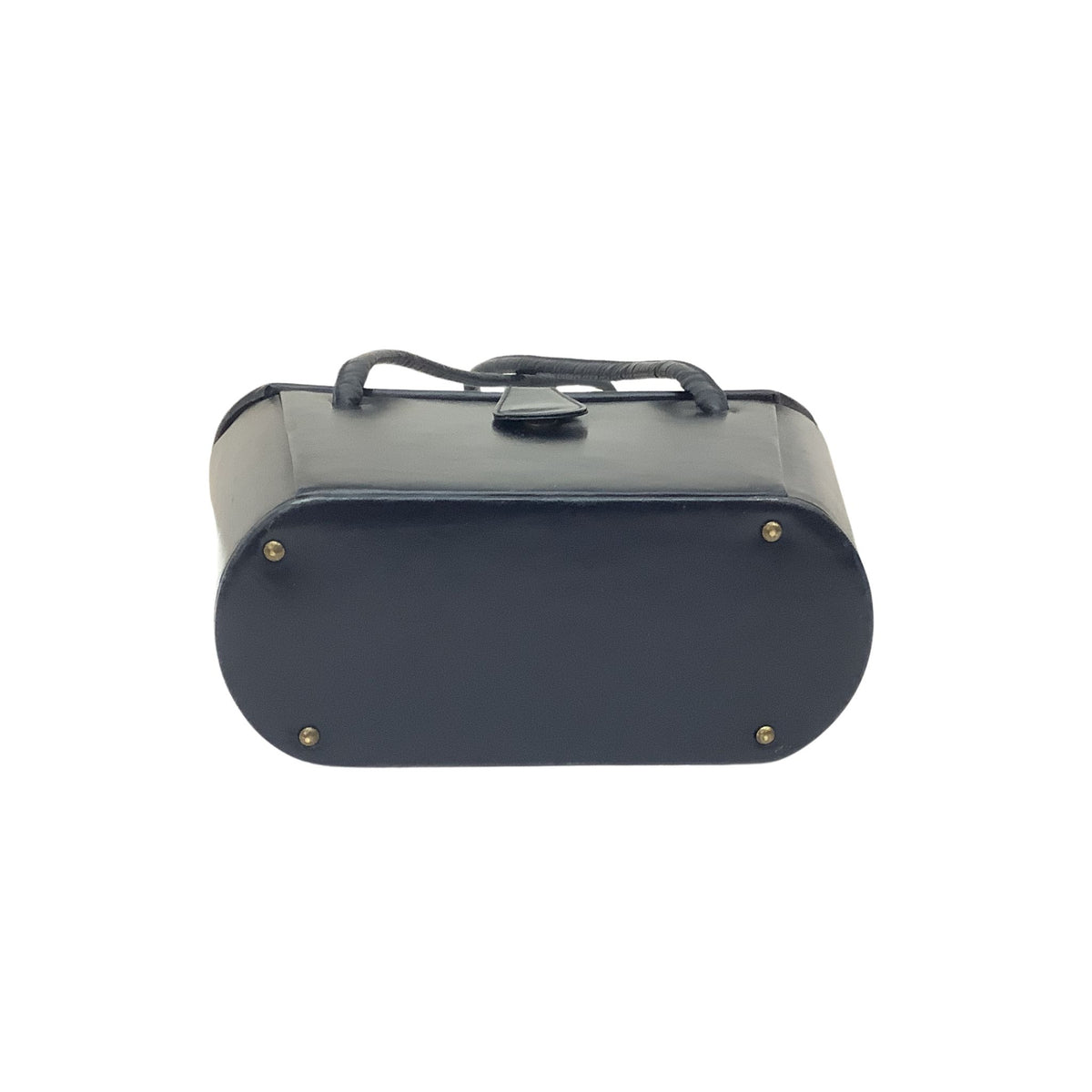 Bottom view of a navy blue handbag with a top handle partially visible