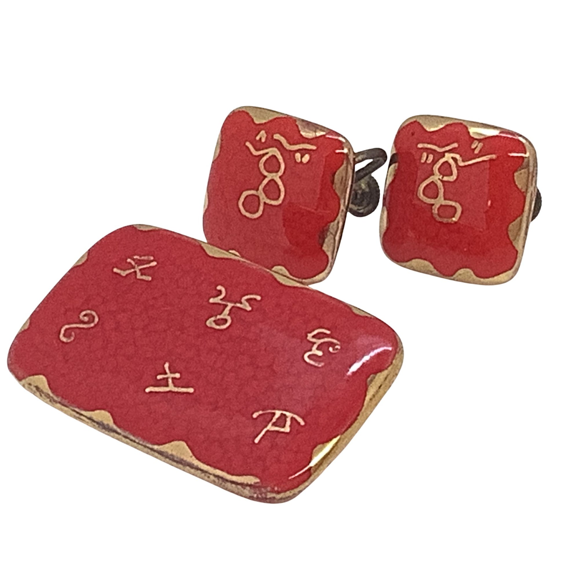 Vintage 1950s Earrings and Pin set on a white background