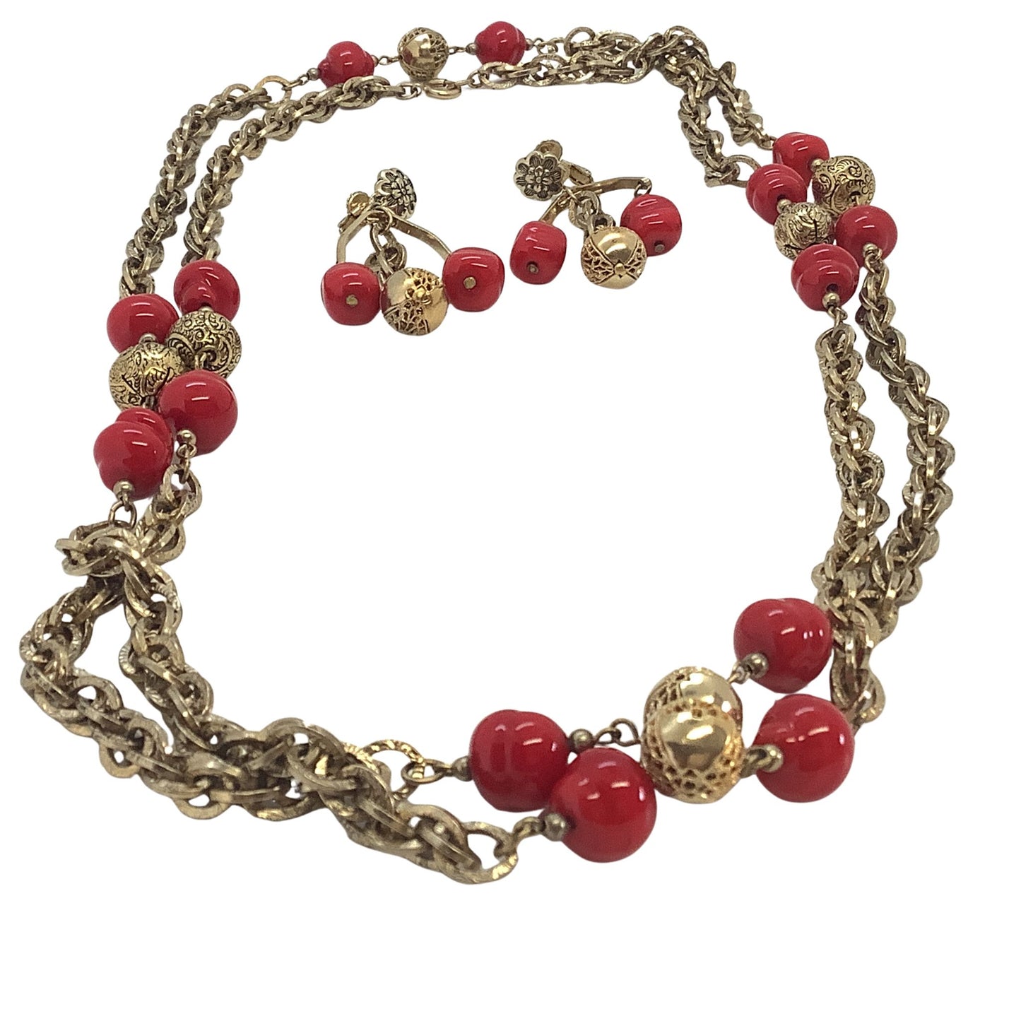 Necklace with red beads and gold chain on a white background