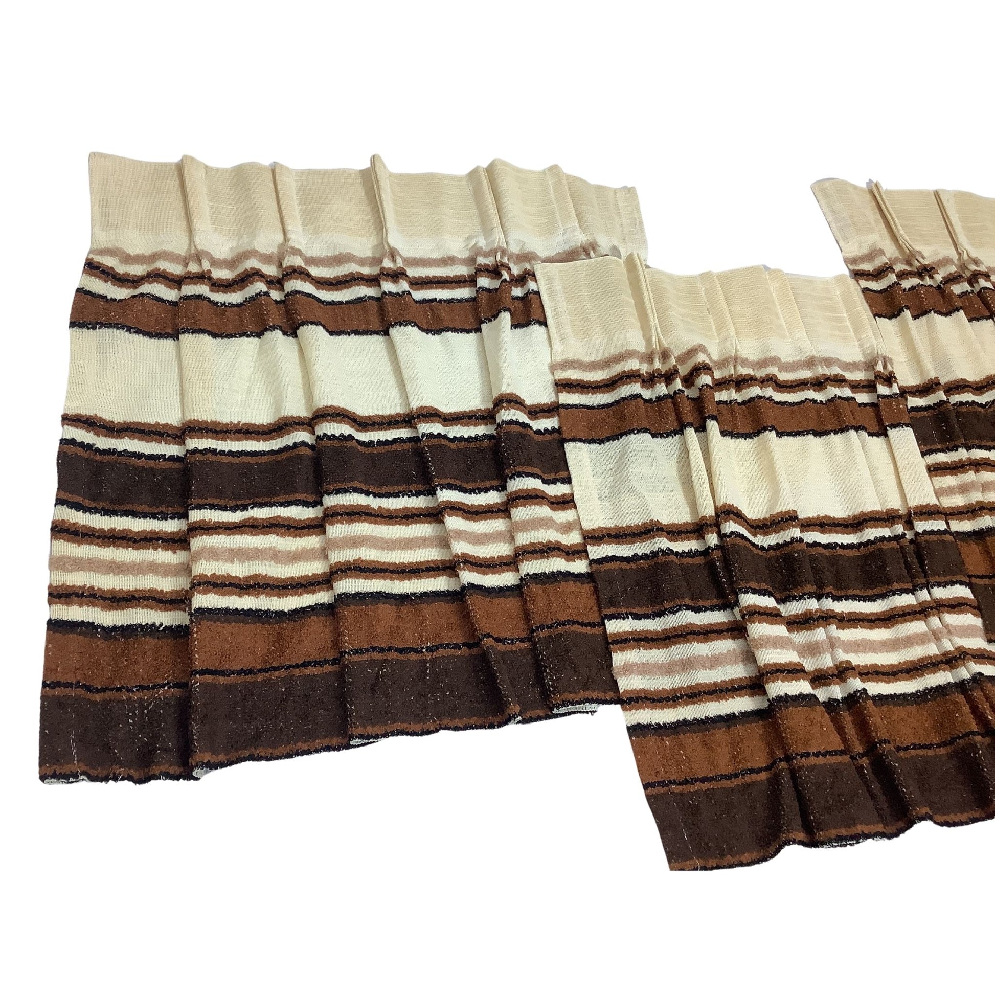 Side view of three pleated cafe curtain panels with horizontal stripes in beige, black, and brown, arranged on a plain white background.
