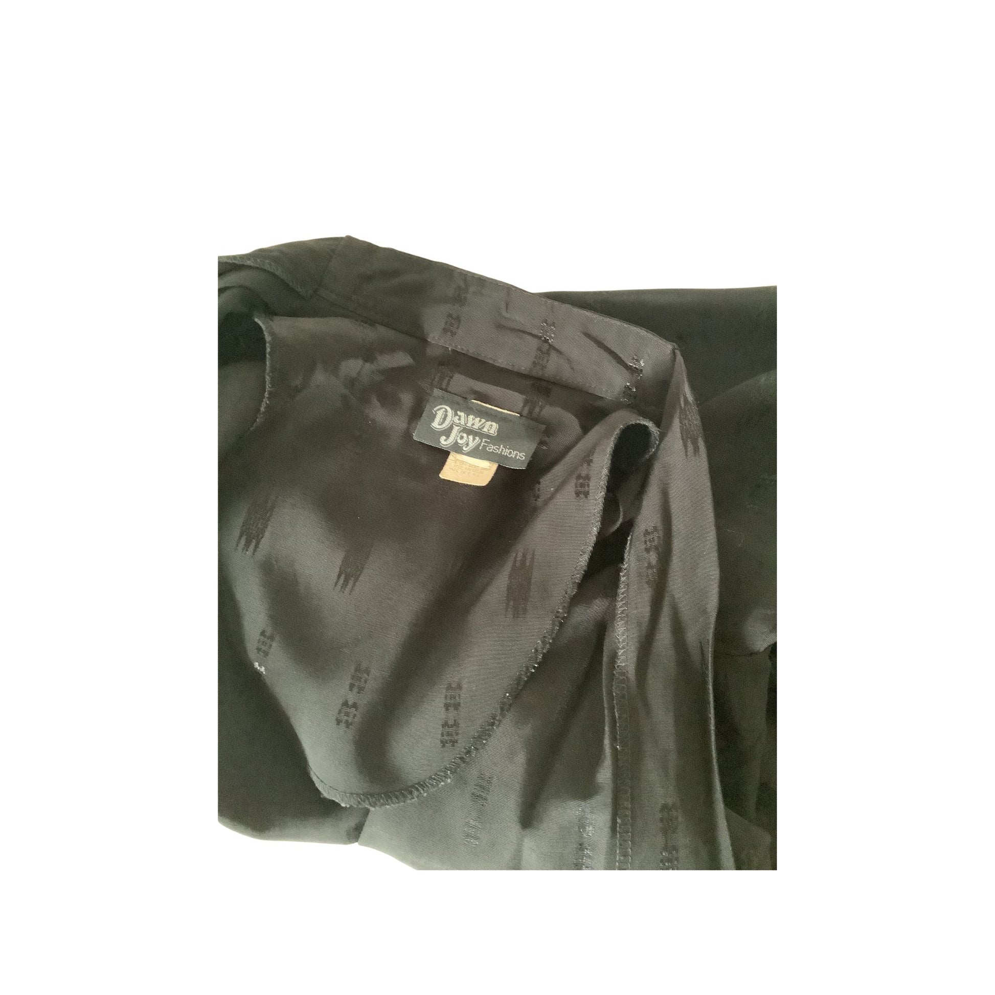 A close-up of a black jacket showing the interior collar lining with a visible brand label.