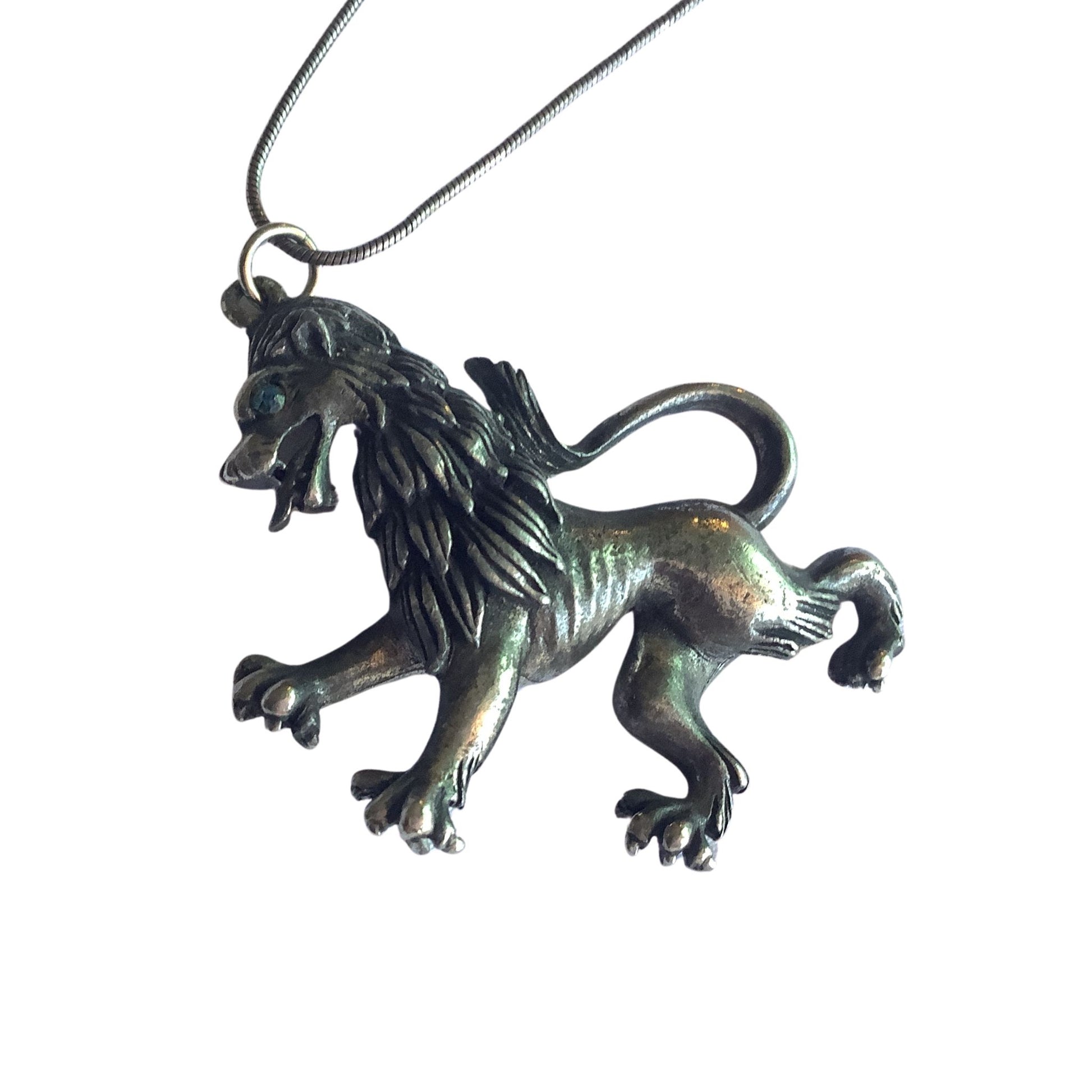 Vintage Florenza tarnished lion pendant close-up 