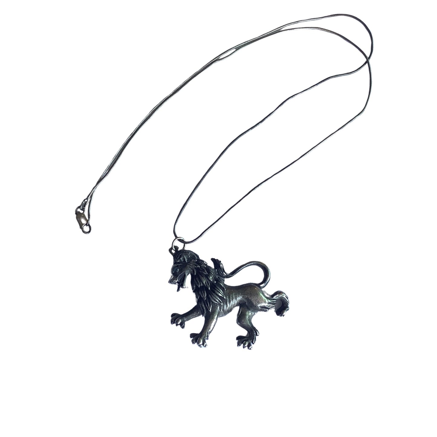 Vintage Florenza tarnished lion pendant top view