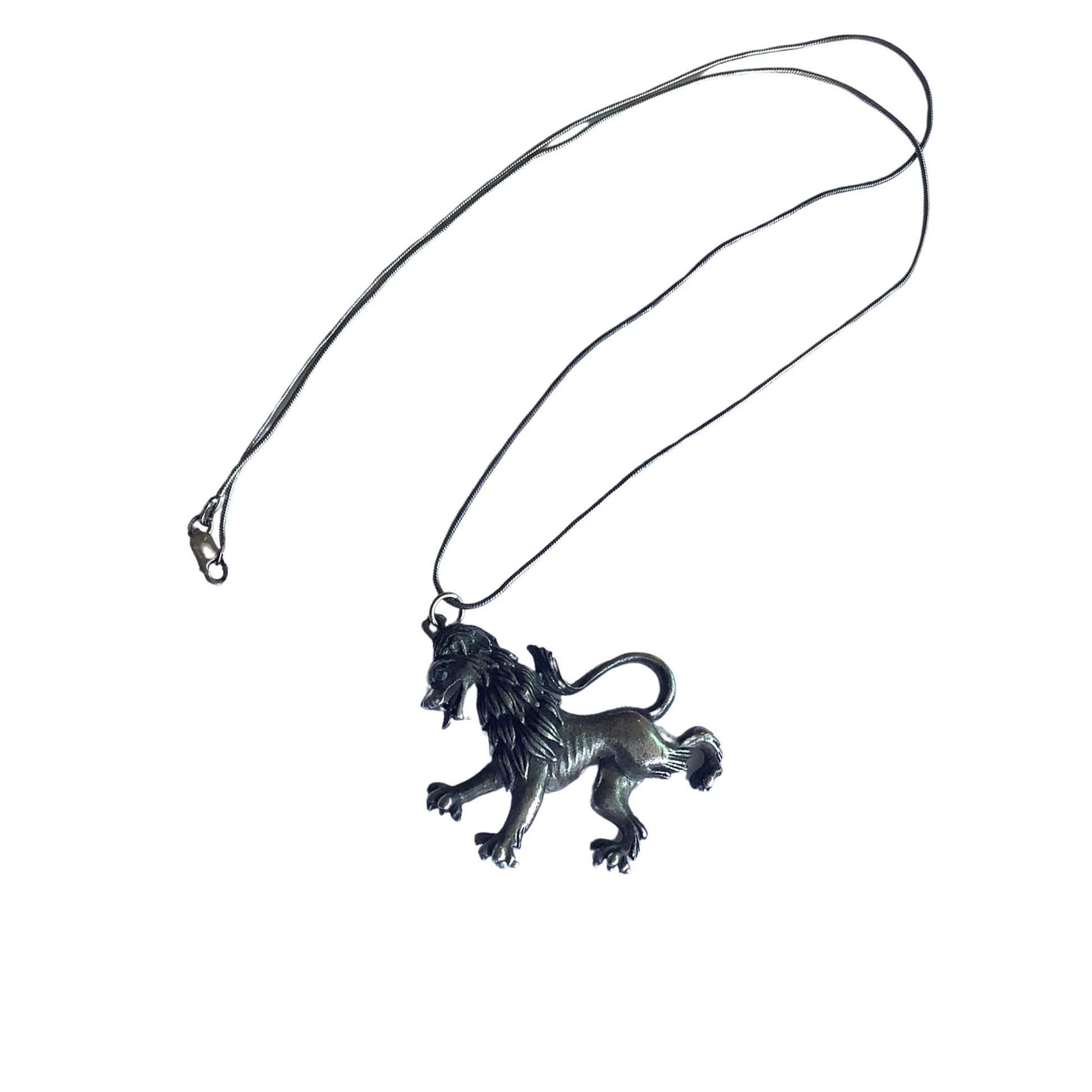 Vintage Florenza tarnished lion pendant top view