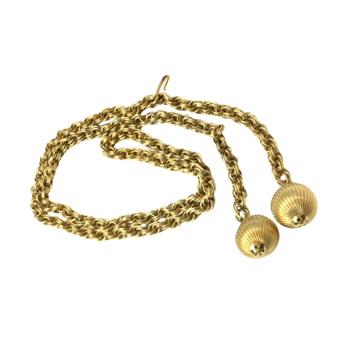 A gold-toned chain belt with two ribbed spherical pendants, displayed on a plain white background.