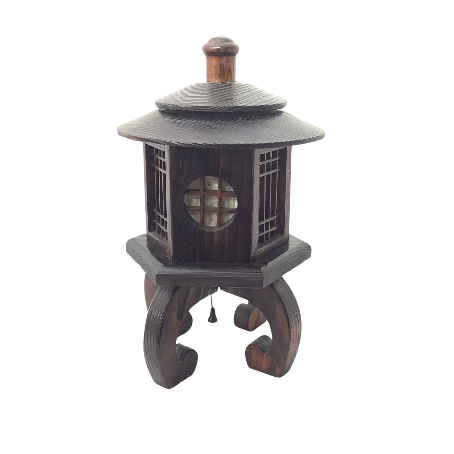 A small dark wooden decorative lantern with a tiered roof, lattice side panels, a round window, and three curved legs on a white background.