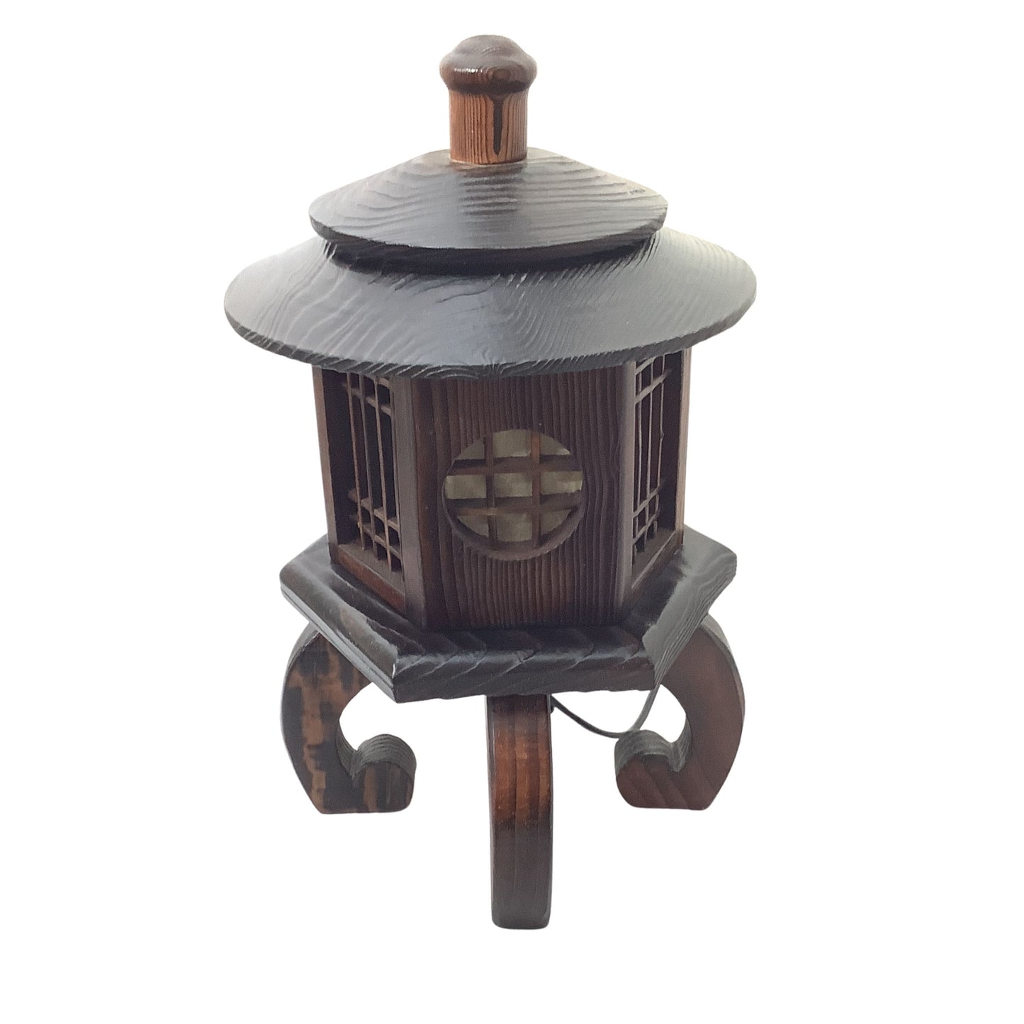 A dark brown wooden decorative lantern with a tiered roof, curved legs, and a circular window detail, isolated on a white background.