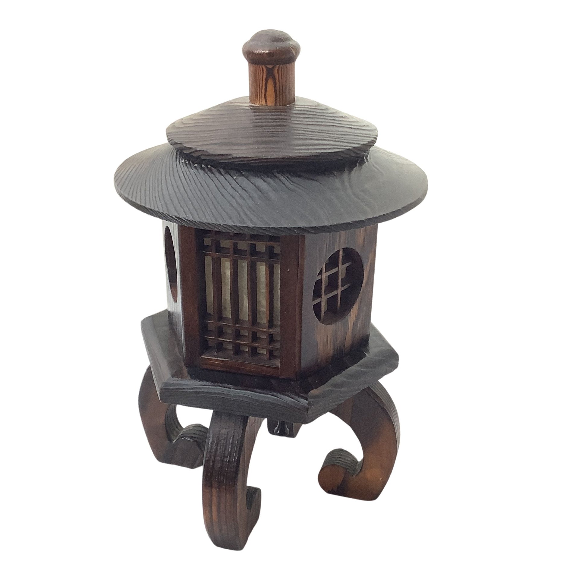 A dark brown traditional Japanese style lamp with decorative wooden cap, lattice window, and curved legs, isolated on a white background.