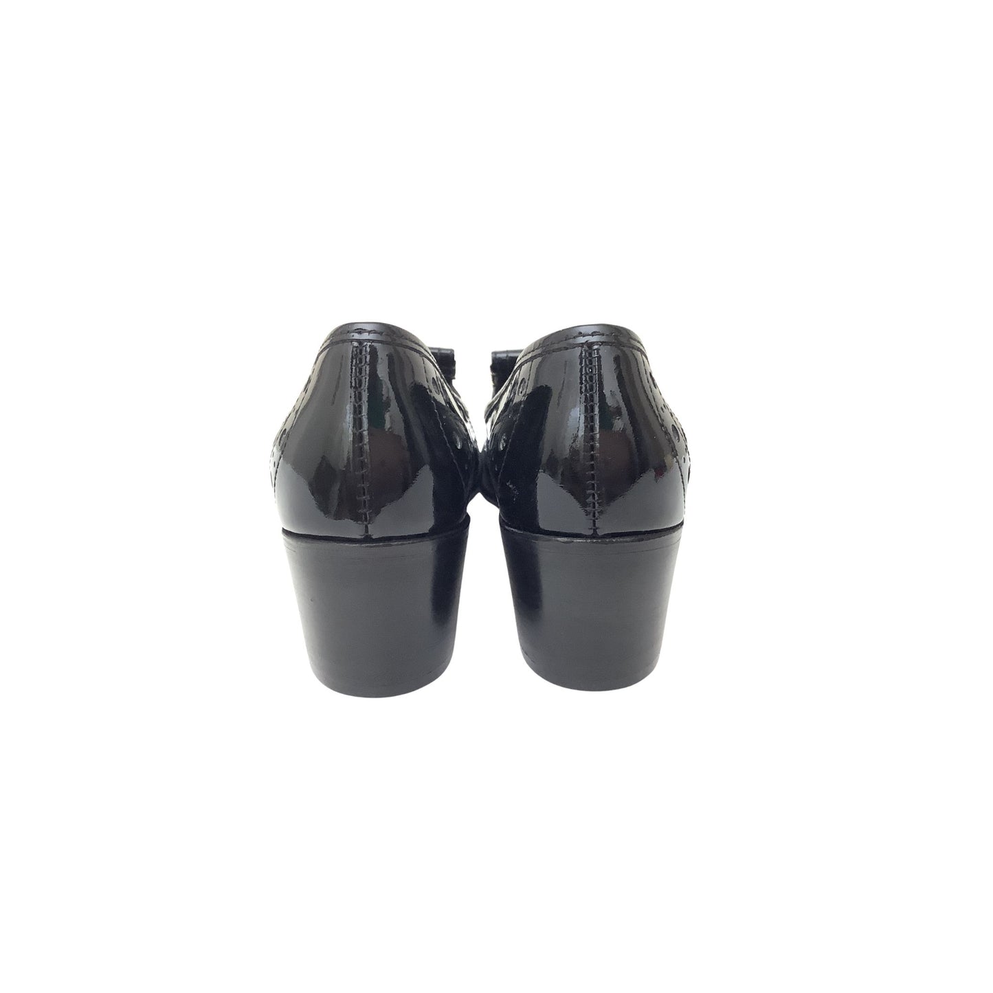Black patent leather block-heel shoes shown from the back, featuring glossy patent finish and stacked block heels, set against a plain white background.