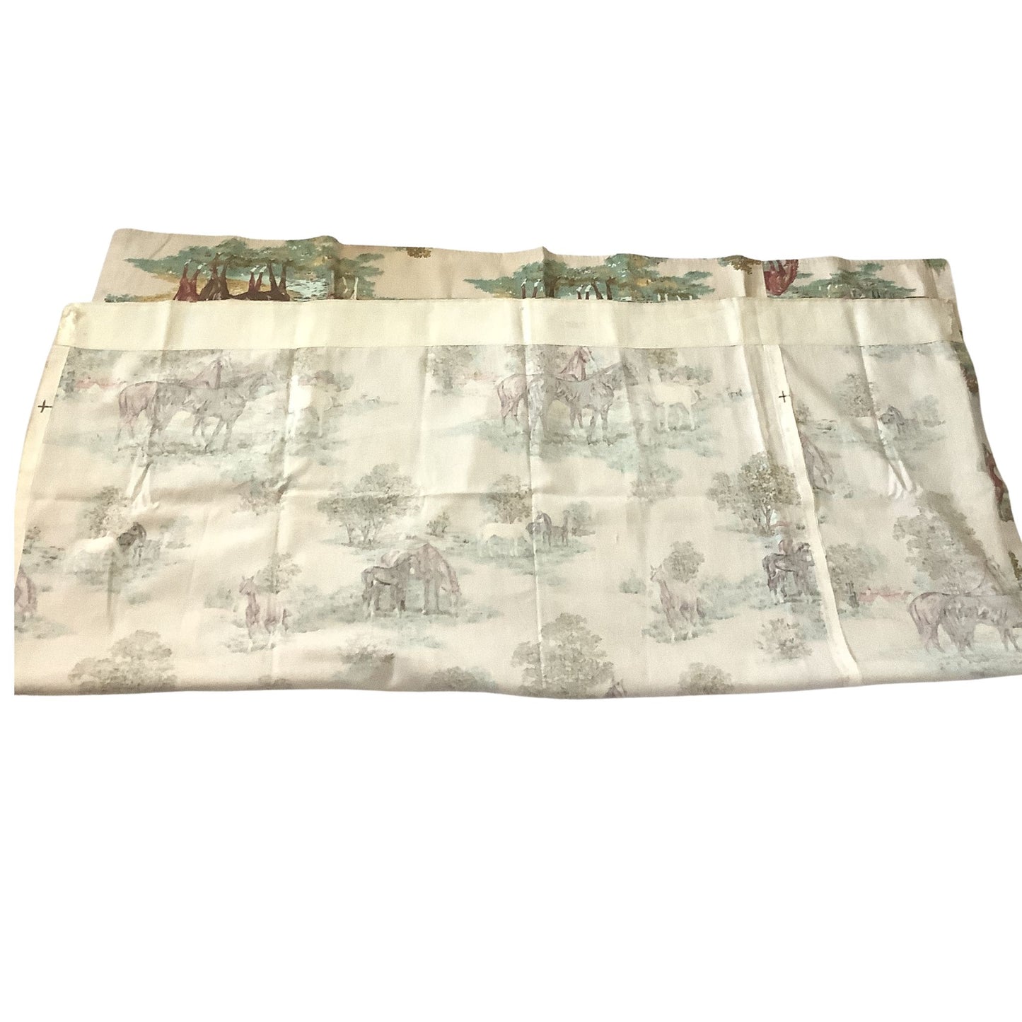 Vintage western curtain folded  featuring a light beige back view.
