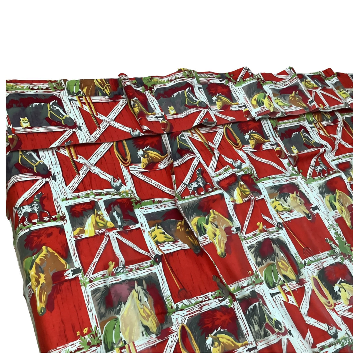 A close-up of vintage western curtains and valance featuring a red barn with white trim and painted horses in yellow, brown, and gray inside the barn stalls.