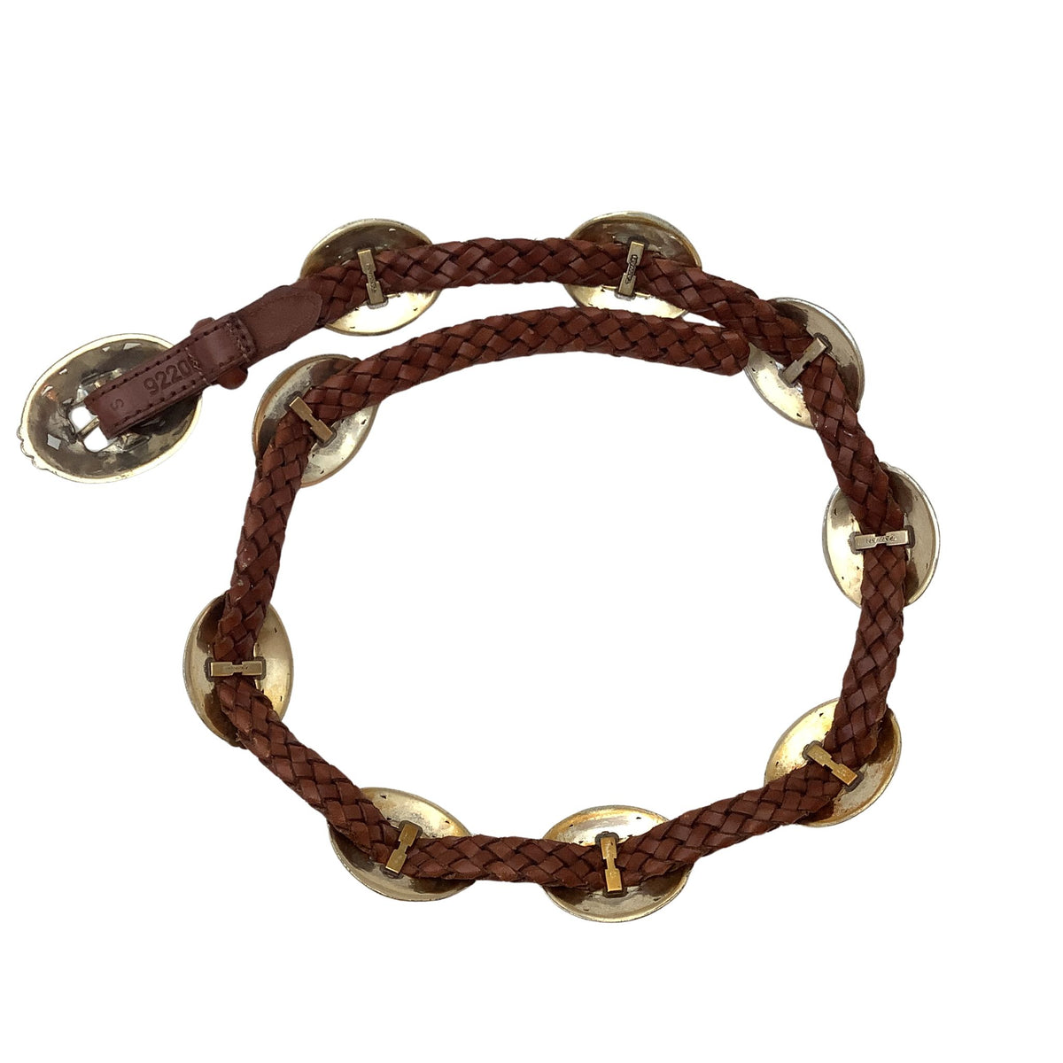 A brown braided leather belt featuring a row of round, antique gold-tone metal Conchos attached along the belt strap, displayed on a clean white background.