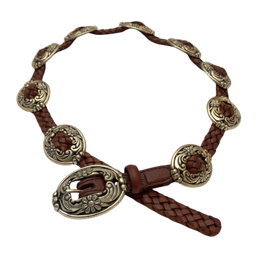 A brown braided leather belt with ornate antique bronze Conchos and a matching buckle, displayed on a clean white background.