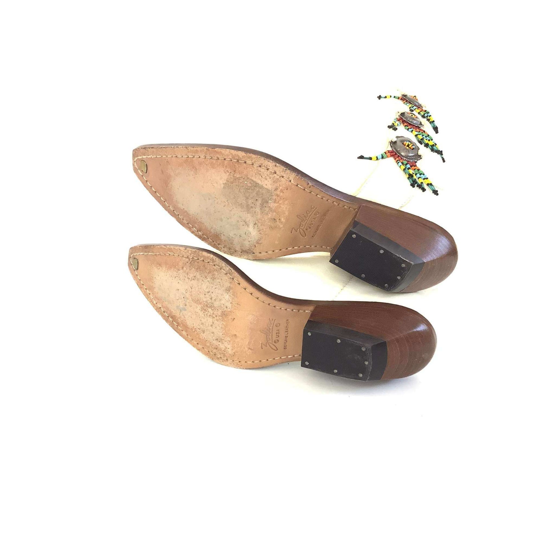 Zodiac beaded white cowboy boots view of soles